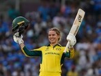 Australia's Phoebe Litchfield celebrates her century during the ICC Women's Cricket World Cup cricket semi final match against India