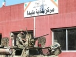 A Lebanese soldier sits on top of a military vehicle outside the municipality building of the southern Lebanese border village of Blida in the aftermath of an Israeli army raid on the village, on October 30 A Lebanese soldier sits on top of a military vehicle outside the municipality building of the southern Lebanese border village of Blida in the aftermath of an Israeli army raid on the village, on October 30