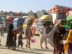 Afghan refugees arrive near the Pakistan-Afghanistan border in Chaman