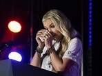 Erika Kirk, widow of Charlie Kirk, became tearful during a Turning Point USA event honoring her late husband. REUTERS/Jonathan Ernst/Pool