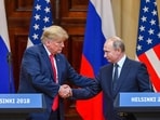 US President Donald Trump (L) and Russia's President Vladimir Putin shake hands before attending a joint press conference. (File image)