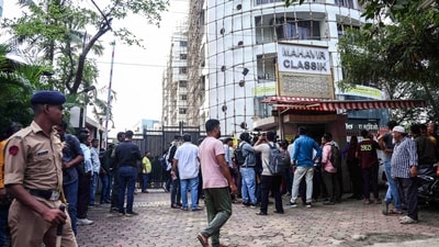 People gather outside the RA studio at Powai, where a man, identified as Rohit Arya, held several children hostage. He was later shot during the rescue operation, in Mumbai on Thursday. (ANI) People gather outside the RA studio at Powai, where a man, identified as Rohit Arya, held several children hostage. He was later shot during the rescue operation, in Mumbai on Thursday. (ANI)