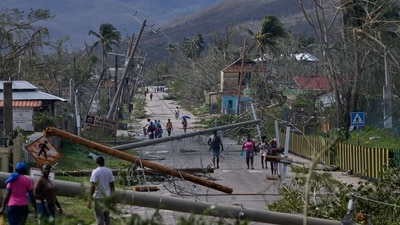 Residents walk through Lacovia Tombstone, Jamaica, in the aftermath of Hurricane Melissa. (AP) Residents walk through Lacovia Tombstone, Jamaica, in the aftermath of Hurricane Melissa. (AP)