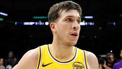 Austin Reaves made a hilarious request to Luka Doncic and LeBron James after win against the Timberwolves. (Getty Images via AFP) Austin Reaves made a hilarious request to Luka Doncic and LeBron James after win against the Timberwolves. (Getty Images via AFP)