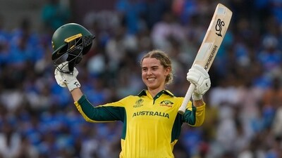 Australia's Phoebe Litchfield celebrates her century during the ICC Women's Cricket World Cup cricket semi final match against India (AP) Australia's Phoebe Litchfield celebrates her century during the ICC Women's Cricket World Cup cricket semi final match against India (AP)