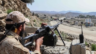 A Taliban security personnel stands guard along a road near the Ghulam Khan zero-point border crossing between Afghanistan and Pakistan in Gurbuz district. (AFP) A Taliban security personnel stands guard along a road near the Ghulam Khan zero-point border crossing between Afghanistan and Pakistan in Gurbuz district. (AFP)