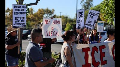 Protesters hold signs during an ”ICE Out of OC” rally at Home Depot in Garden Grove, California, on August 19, 2025. (Getty Images) Protesters hold signs during an ”ICE Out of OC” rally at Home Depot in Garden Grove, California, on August 19, 2025. (Getty Images)