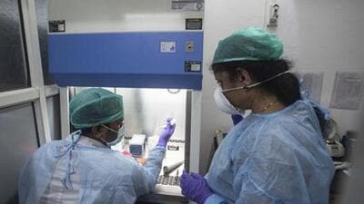 Pune, India - March 19, 2020: B J Government Medical College's Molecular lab prepares for Coronavirus testing at Sassoon hospital in Pune, India, on Thursday, March 19, 2020. (Photo by Pratham Gokhale/Hindustan Times) (Pratham Gokhale/HT Photo) Pune, India - March 19, 2020: B J Government Medical College's Molecular lab prepares for Coronavirus testing at Sassoon hospital in Pune, India, on Thursday, March 19, 2020. (Photo by Pratham Gokhale/Hindustan Times) (Pratham Gokhale/HT Photo)