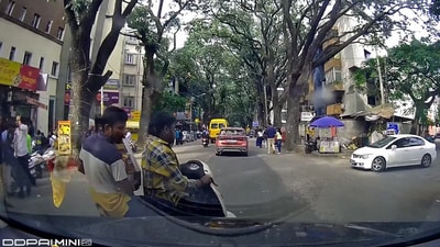A viral video sparked a debate on road safety in Bengaluru, after showing a biker almost colliding with a car while distracted on his phone. (X) A viral video sparked a debate on road safety in Bengaluru, after showing a biker almost colliding with a car while distracted on his phone. (X)
