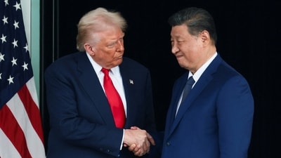 US President Donald Trump and Chinese President Xi Jinping talk as they leave after a bilateral meeting at Gimhae International Airport, on the sidelines of the Asia-Pacific Economic Cooperation (APEC) summit, in Busan, South Korea, October 30, 2025. (REUTERS)