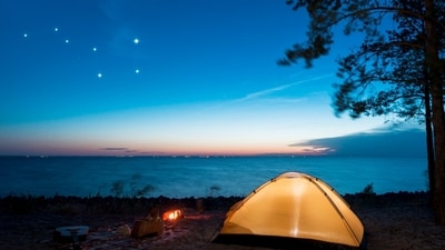 Calm down and embrace peace under the stars as you go camping. (Picture credit: Freepik ) Calm down and embrace peace under the stars as you go camping. (Picture credit: Freepik )