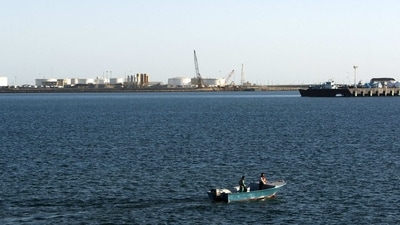 A speed boat passes by oil docks at the port of Kalantari in the city of Chabahar, east of the Strait of Hormuz. (File photo/Reuters ) A speed boat passes by oil docks at the port of Kalantari in the city of Chabahar, east of the Strait of Hormuz. (File photo/Reuters )