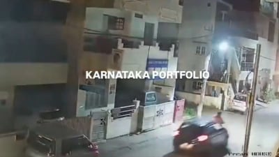 Screengrab of the CCTV footage shared on social media showing the exact moment when the scooter was hit by the car. Screengrab of the CCTV footage shared on social media showing the exact moment when the scooter was hit by the car.