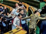 BJP MLAs marshalled out for protesting the rejection of their adjournment motion in the Jammu and Kashmir assembly in Srinagar on Thursday. (ANI) BJP MLAs marshalled out for protesting the rejection of their adjournment motion in the Jammu and Kashmir assembly in Srinagar on Thursday. (ANI)
