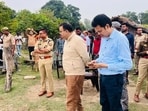 Senior officials near the site of the Bahraich boat tragedy. (HT Photo) Senior officials near the site of the Bahraich boat tragedy. (HT Photo)