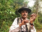 With a black-banded trinket snake in Meghalaya. (Subhamoy Bhattacharjee)