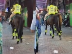 An Indian woman posted a clip of Dubai Police riding horses through a crowded night market. An Indian woman posted a clip of Dubai Police riding horses through a crowded night market.
