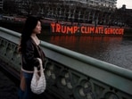 Signs of protests were seen across London on the day of Donald Trump's inauguration as the US' 47th president earlier this year with people opposing his stance on climate change.(AFP)