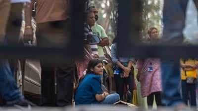 When he children did not step out of lunch, their waiting parents grew anxious. (HT Photo) When he children did not step out of lunch, their waiting parents grew anxious. (HT Photo)