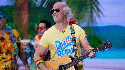 Peter Alexander embraced a tropical vibe as Jimmy Buffett during NBC's Today show Halloween celebration as he donned a bright yellow T-shirt with “One Love One Ocean” printed on it. (Photo by Charles Sykes/Invision/AP) (Charles Sykes/Invision/AP)