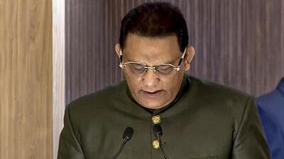Congress leader and former cricketer Mohammad Azharuddin takes oath as a minister in the Telangana cabinet on Friday. (X) Congress leader and former cricketer Mohammad Azharuddin takes oath as a minister in the Telangana cabinet on Friday. (X)