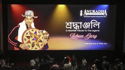 Fans of late singer and actor Zubeen Garg watch his final film 'Roi Roi Binale' in a movie theatre in Guwahati on Friday (PTI)