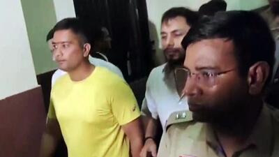 Former Chhattisgarh chief minister Bhupesh Baghel's son Chaitanya Baghel (in yellow) after his arrest in July this year. (ANI File) Former Chhattisgarh chief minister Bhupesh Baghel's son Chaitanya Baghel (in yellow) after his arrest in July this year. (ANI File)