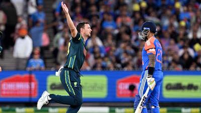Josh Hazlewood (C) celebrates dismissing India's Suryakumar Yadav in the second T20I in Melbourne on Friday. (AFP)