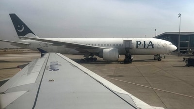 File photo of Pakistan International Airlines (PIA) passenger plane on on tarmac, as seen through a plane window, at the Islamabad International Airport. (REUTERS)