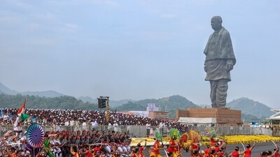 Artists perform during the 'Rashtriya Ekta Diwas' programme organised on Sardar Vallabhbhai Patel's 150th birth anniversary, at the Statue of Unity. (PTI) Artists perform during the 'Rashtriya Ekta Diwas' programme organised on Sardar Vallabhbhai Patel's 150th birth anniversary, at the Statue of Unity. (PTI)
