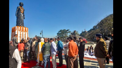 People pay tribute to a statue of former PM Indira Gandhi on her death anniversary, at the Ridge, in Shimla, on Friday. (PTI) People pay tribute to a statue of former PM Indira Gandhi on her death anniversary, at the Ridge, in Shimla, on Friday. (PTI)