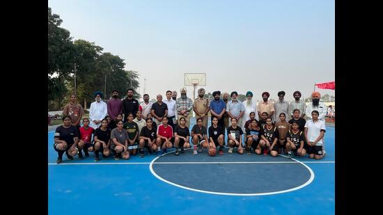 Players from Shri Muktsar Sahib and Fatehgarh Sahib girls’ teams after their clash on Day 1 of 75th Junior Punjab Basketball Championship in Ludhiana on Friday. (HT Photo)
