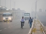 A thick layer of smog seen on the Delhi-Gurugram Expressway during morning hours in Gurugram on Friday. A thick layer of smog seen on the Delhi-Gurugram Expressway during morning hours in Gurugram on Friday.