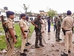 Patna: Security personnel keep vigil outside a hospital where the post-mortem of Jan Suraaj leader late Dularchand Yadav is scheduled to take place, a day after his alleged murder, at Barh in Patna district. (PTI Photo) 