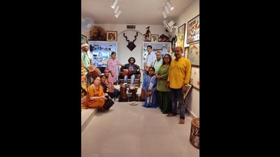 The statue of Swarnab Bagchi surrounded by visitors, at the ‘memory museum’ built by his parents, Sthita and Manab Bagchi (extreme right). The statue of Swarnab Bagchi surrounded by visitors, at the ‘memory museum’ built by his parents, Sthita and Manab Bagchi (extreme right).