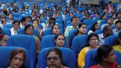 Booth Level Officers (BLOs) undergo training for the upcoming Special Intensive Revision (SIR) of electoral rolls in West Bengal, in Kolkata, on Saturday. (PTI) Booth Level Officers (BLOs) undergo training for the upcoming Special Intensive Revision (SIR) of electoral rolls in West Bengal, in Kolkata, on Saturday. (PTI)