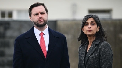 US Vice President JD Vance (L) stands with his wife Usha Vance. (AFP FILE)