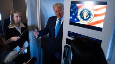 File photo of President Donald Trump speaking to reporters as Press Secretary Karoline Leavitt, left, listens. (AP) File photo of President Donald Trump speaking to reporters as Press Secretary Karoline Leavitt, left, listens. (AP)