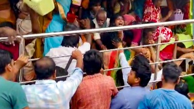 **EDS: SCREENSHOT VIA PTI VIDEOS** Srikakulam: People gather at Venkateswara temple, at Kasibugga in Srikakulam district, Andhra Pradesh, Saturday, Nov. 1, 2025. At least seven people were killed and two others suffered injuries after a stampede occurred at the temple on Saturday. (PTI Photo)(PTI11_01_2025_000106B) (PTI) **EDS: SCREENSHOT VIA PTI VIDEOS** Srikakulam: People gather at Venkateswara temple, at Kasibugga in Srikakulam district, Andhra Pradesh, Saturday, Nov. 1, 2025. At least seven people were killed and two others suffered injuries after a stampede occurred at the temple on Saturday. (PTI Photo)(PTI11_01_2025_000106B) (PTI)