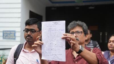 Protests erupted as BLOs threatened to boycott work without security and official acknowledgment. (PTI) Protests erupted as BLOs threatened to boycott work without security and official acknowledgment. (PTI)