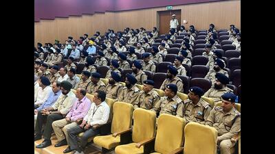 The induction ceremony for the ex-servicemen was held at the NINE auditorium at PGIMER, Chandigarh, on Saturday. (HT)