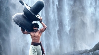 Baahubali The Epic box office collection day 2: Prabhas carrying the shivling on his shoulders in Baahubali: The Beginning. Baahubali The Epic box office collection day 2: Prabhas carrying the shivling on his shoulders in Baahubali: The Beginning.