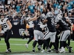 Jacksonville Jaguars place kicker Cam Little (39) watches his 68-yard field goal Jacksonville Jaguars place kicker Cam Little (39) watches his 68-yard field goal