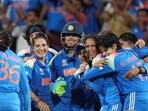 India’s players celebrate after winning the ICC Women's World Cup final against South Africa, at the DY Patil Stadium, in Navi Mumbai on Sunday. (PTI) India’s players celebrate after winning the ICC Women's World Cup final against South Africa, at the DY Patil Stadium, in Navi Mumbai on Sunday. (PTI)