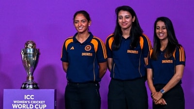 Harmanpreet Kaur, Smriti Mandhana, and Jemimah Rodrigues pose with the Women's World Cup trophy in the lead up to the tournament. (AFP) Harmanpreet Kaur, Smriti Mandhana, and Jemimah Rodrigues pose with the Women's World Cup trophy in the lead up to the tournament. (AFP)