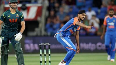 India pacer Arshdeep Singh appeals as Australia's Marcus Stoinis looks on in the third T20I at the Bellerive Oval in Hobart on Sunday. (AFP)