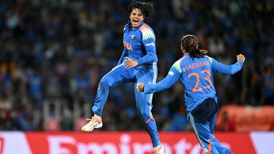 India's Shafali Verma (L) celebrates with her team captain Harmanpreet Kaur after taking the wicket of South Africa's Marizanne Kapp during the ICC Women's Cricket World Cup 2025 one-day international (ODI) final match between India and South Africa at the DY Patil Stadium in Navi Mumbai on November 2, 2025. (Photo by Punit PARANJPE / AFP) / -- IMAGE RESTRICTED TO EDITORIAL USE - STRICTLY NO COMMERCIAL USE -- (AFP) India's Shafali Verma (L) celebrates with her team captain Harmanpreet Kaur after taking the wicket of South Africa's Marizanne Kapp during the ICC Women's Cricket World Cup 2025 one-day international (ODI) final match between India and South Africa at the DY Patil Stadium in Navi Mumbai on November 2, 2025. (Photo by Punit PARANJPE / AFP) / -- IMAGE RESTRICTED TO EDITORIAL USE - STRICTLY NO COMMERCIAL USE -- (AFP)