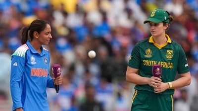 India's captain Harmanpreet Kaur, left, and South Africa's captain Laura Wolvaardt during the toss before the Women's World Cup final match (PTI) India's captain Harmanpreet Kaur, left, and South Africa's captain Laura Wolvaardt during the toss before the Women's World Cup final match (PTI)