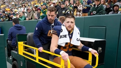 Green Bay Packers tight end Tucker Kraft leaves the field on a cart after an injury during the second half against the Carolina Panthers, (AP) Green Bay Packers tight end Tucker Kraft leaves the field on a cart after an injury during the second half against the Carolina Panthers, (AP)