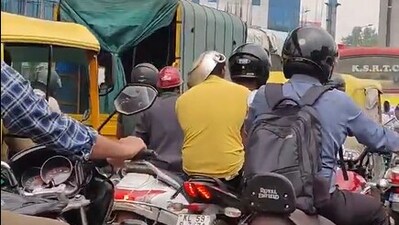 In a comically creative attempt to dodge a traffic fine, a Bengaluru rider was spotted wearing a frying pan as a helmet, making for a viral post and hilarious replies online. (X) In a comically creative attempt to dodge a traffic fine, a Bengaluru rider was spotted wearing a frying pan as a helmet, making for a viral post and hilarious replies online. (X)